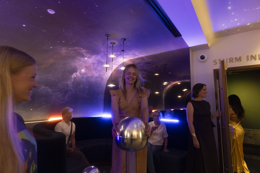 Guests looking at exhibit