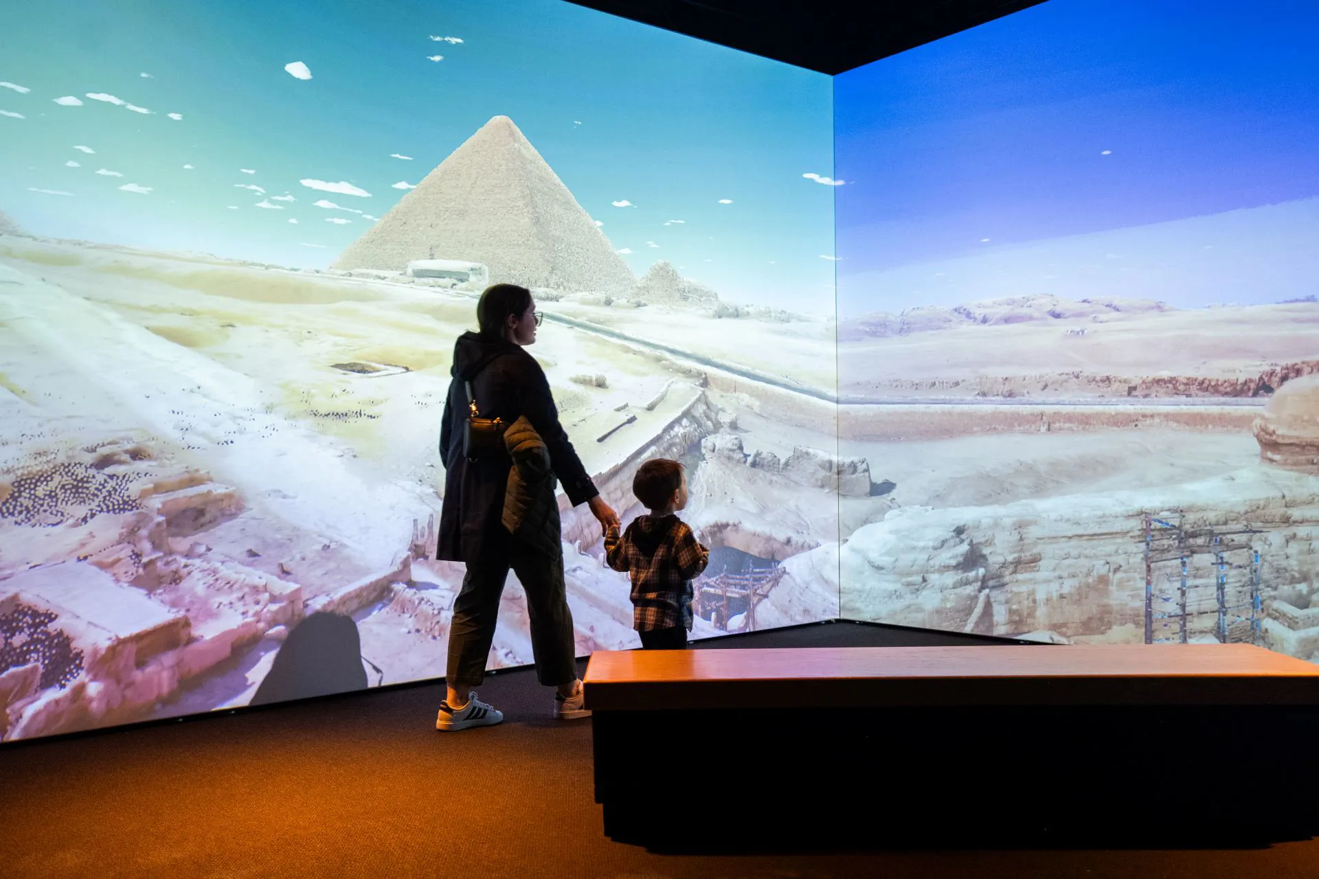 Guests looking at exhibit
