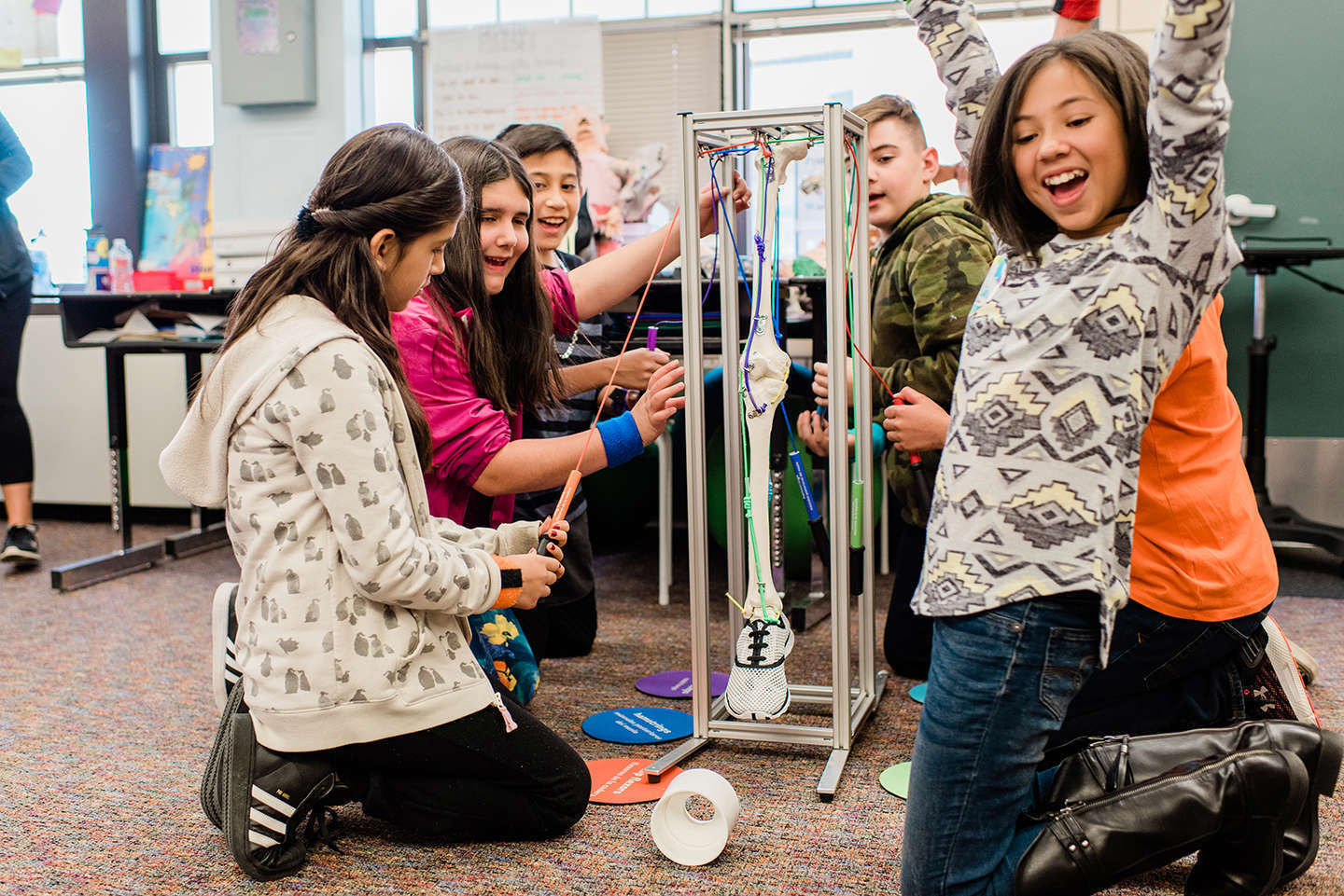 Students complete a challenge in Wonder Workshop "Body Systems in Motion"