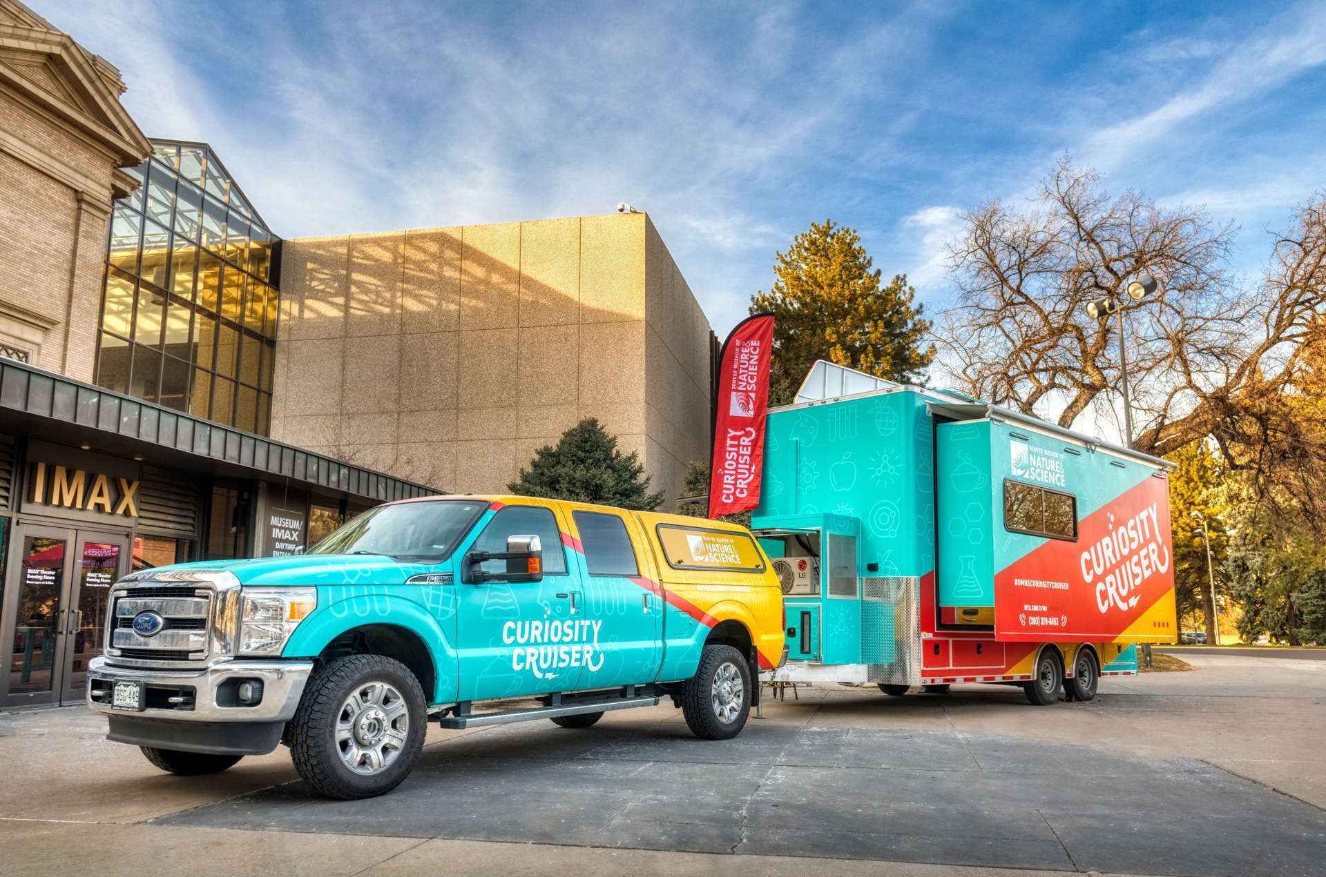 Curiosity Cruiser and the truck in front of the Museum