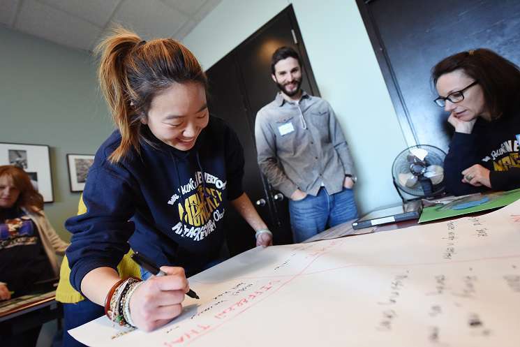 Teachers work together on a professional development activity.