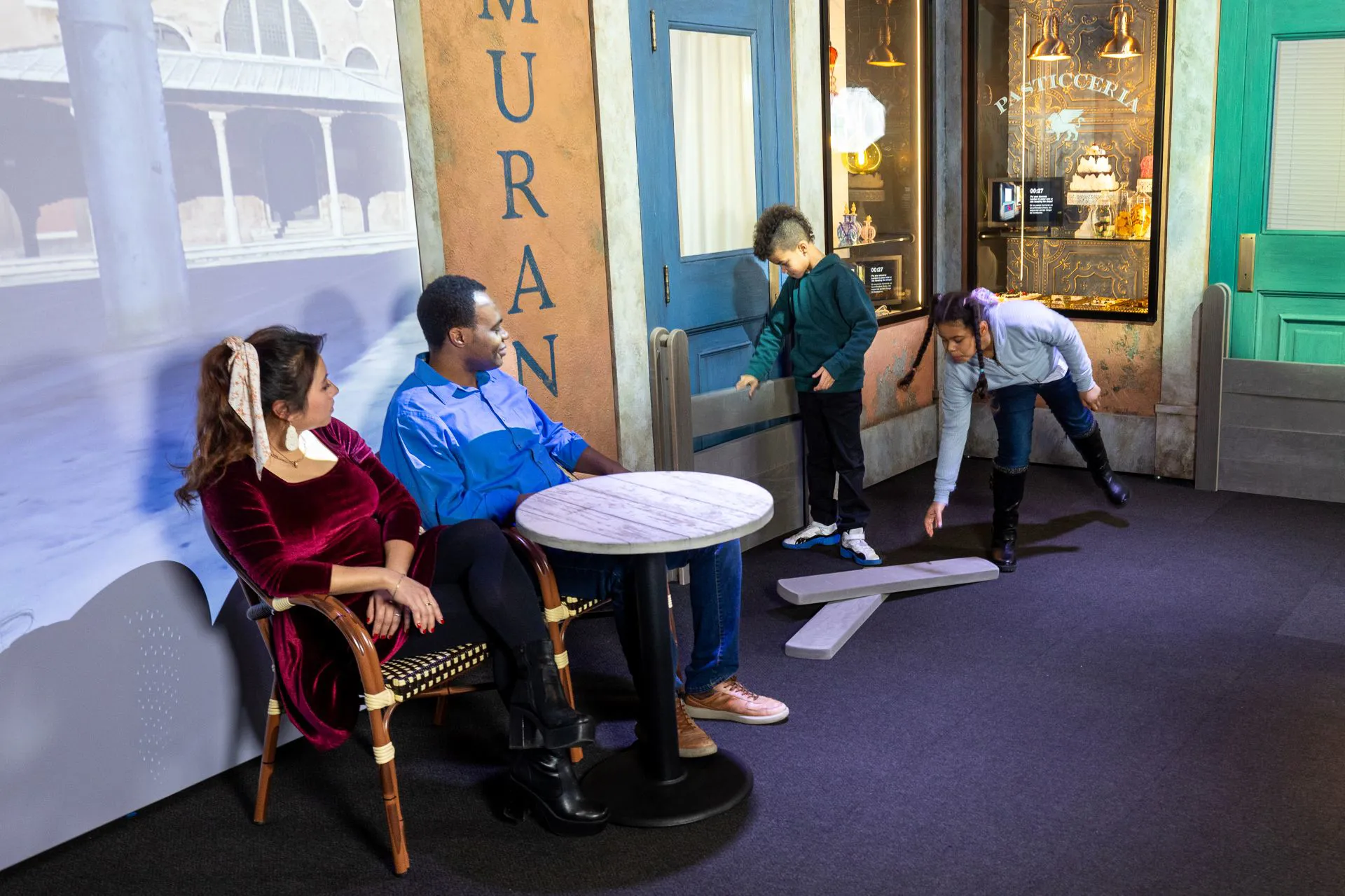 Guests looking at exhibit