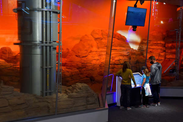 People look into Mars Outpost in Space Odyssey